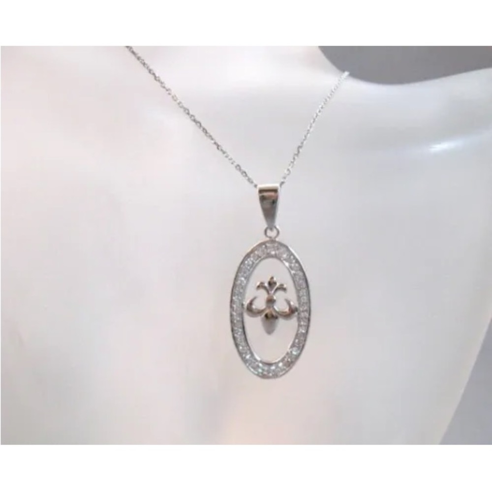 Sterling silver Fleur De Lis oval pendant necklace with cz’s